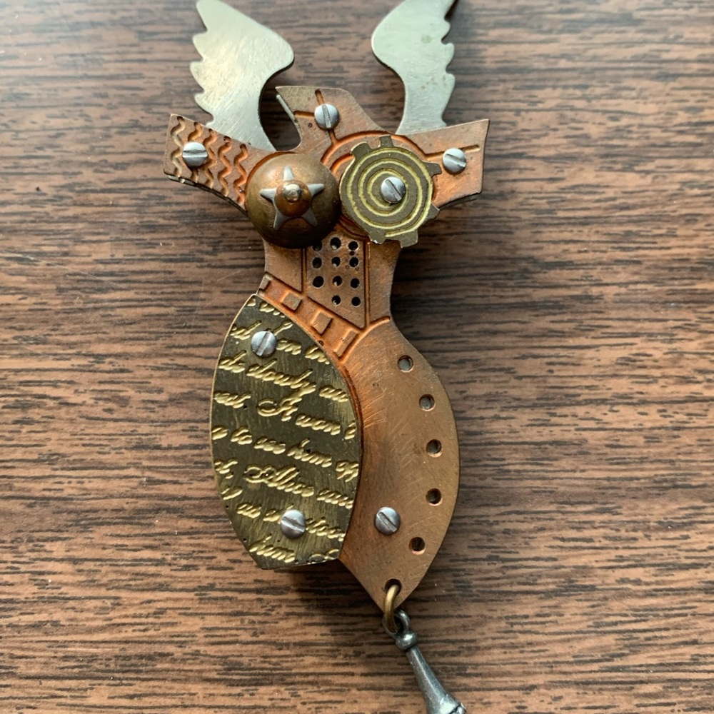 Unique handmade metal brooch